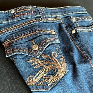 Cruel Girl Loren cut dark bootleg jeans.